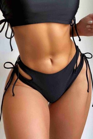 Siyah Drape Detaylı Yüksek Bel Bikini Altı MS41798 Materyal: 80% Polyamid - 20% Likra Paket İçeriği: Bikini Altı Renk: Siyah Beden: 34, 36, 38, 40, 42, 44